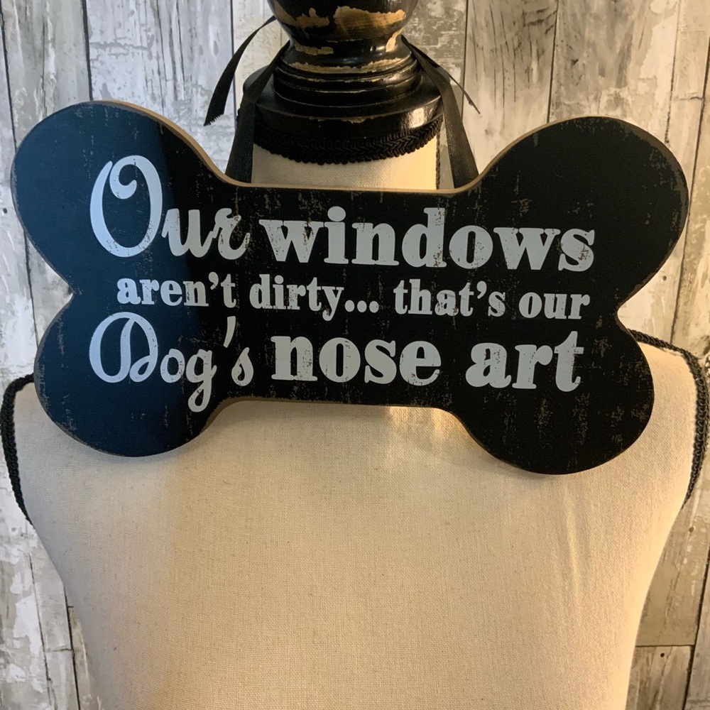 Adorablee bone shaped dog nose art sign.